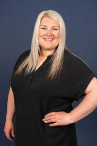 Mme Joanie Courchaine